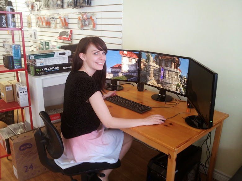 Here is Caitlin trying out our new custom-built gaming machine.