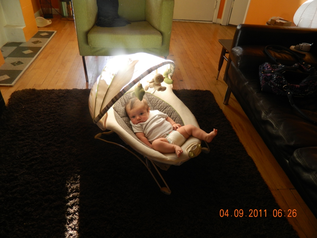 A baby in baby recliner, a photo we recovered in our computer repair lab.